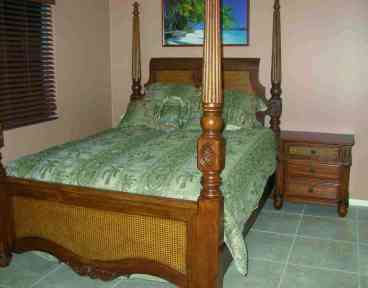 Master bedroom has sliding glass entrance to rear deck.
