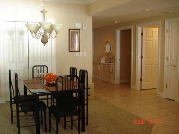 Dining room for comfortable dining along with bar access in the kitchen