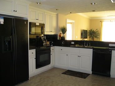 High quality GE Profile appliances are in our gourmet kitchen along with granite counters