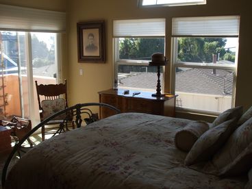 Master bedroom with private patio and fireplace