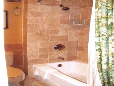 Bathroom with travertine tile