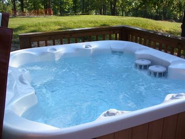 Imagine yourself in the hottub on the back deck overlooking the 6th green