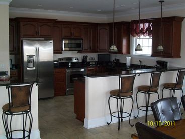 Fully Equipped kitchen w/ stainless appliances