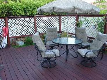 Our patio is really fun for family Socializing and BBQs, relax read a book, head to the beach from here, 75 steps to the sand!