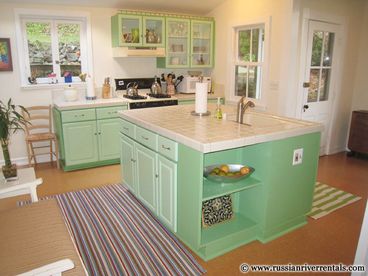 The charming country kitchen is spacious and light-filled, and provides a great place for friends and family to gather while you prepare local fare.