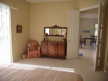 Looking out towards Great Room.
Overlooks pool and lake. Large Walkin closet. Attached his/hers bath.