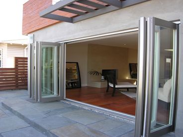 HOUSE OPENS TO FRONT PATIO