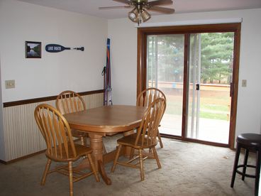 Kitchen/diing room overlooking deck and Lake Dubay