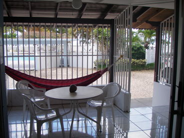 Balcony, first floor just in the front of the pool and beach....