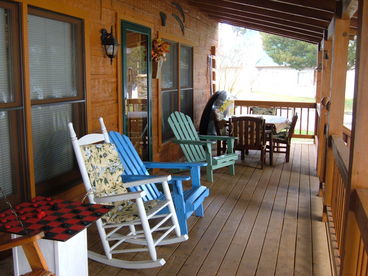 Covered wraparound deck overlooking deck w/360 degree views