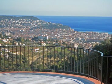 view over city centre Nice and ocean from one of the 2 big sunteraces of Villa Roof of Nice