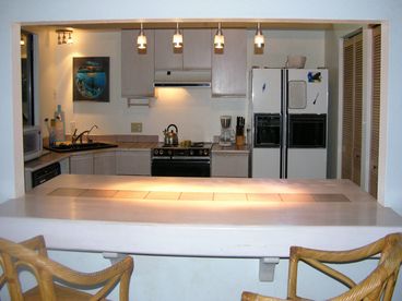 kitchen and bar (we have since this picture bought a new stainless refrigerator and stove)