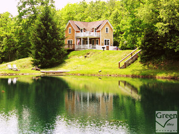 Lovely Cottages w/Stocked Lake, Private Hot Tubs, and Gas Fireplaces.