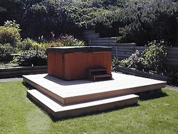 Private hot tub with beautiful landscaping