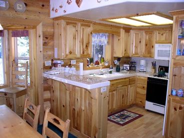 Fully equipped Kitchen open to Dining and Living Rooms