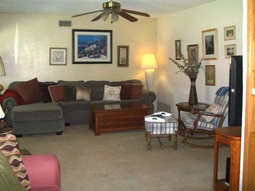 Cozy Living Room has two sleeper sofas, gas log fireplace, HDTV