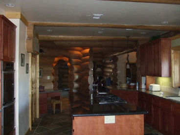 Main Level Kitchen.  Another kitchen on lower level next to game room.