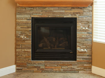 Fireplace provides ample heat and warm ambiance for the cool beach evenings.