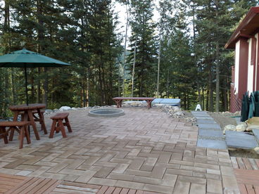Patio area with private hot tub
