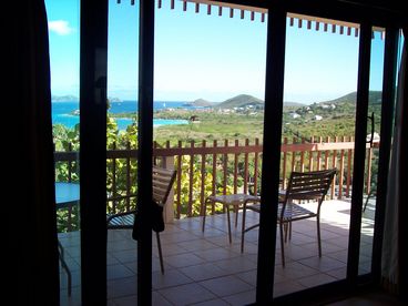 Beautiful views of the Caribbean Sea, St. John and the British Virgin Islands from the large wrap-around gallery.