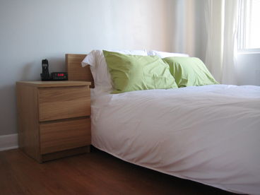 Closed bedroom with a large window