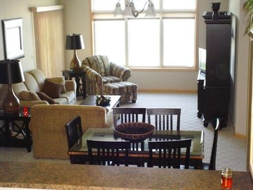 View from kitchen to living room and view of the Lake.