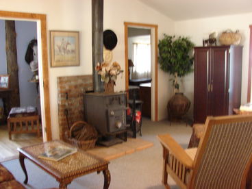 Cozy living room with wood stove.