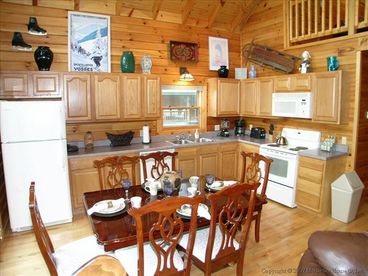 Full kitchen with dining for six.