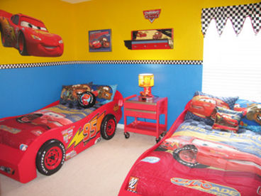 This room has 2 twin beds, an LCD TV, a Playstation 2 Game Console with games and cable.  There is also a built in DVD capability and an alarm clock.