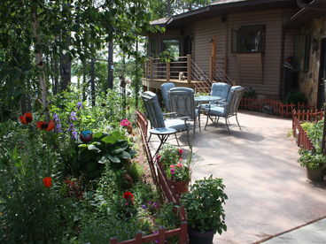 Three outdoor courtyards and one deck overlooks the serene lake.
