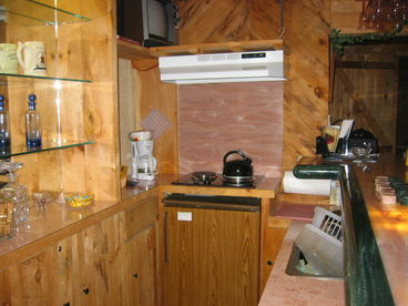 kitchenette, frig, sink, cooktop, convection oven