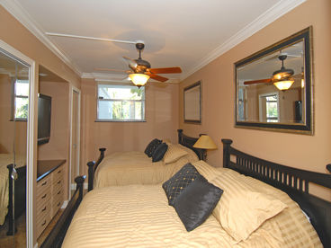 Large masterbedroom with two double beds