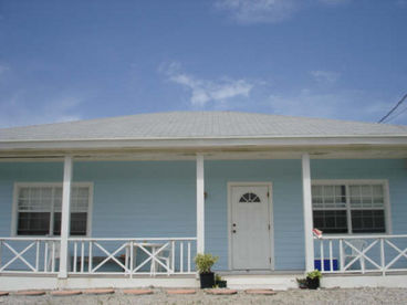 Front view of The Blue Cottage at Papa\'s Place.