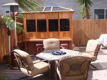Courtyard is private to this unit and features a firepit, patio heater and private hot tub