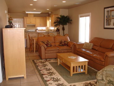 Living room is open to the dining and kitchen