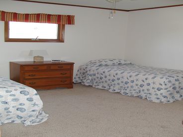 2 twin beds in second bedroom