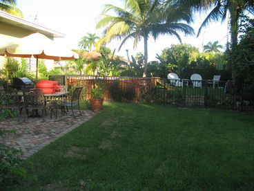 Very large back yard all completely fenced in for privacy.  Plenty of sitting and an above ground pool that is heated.