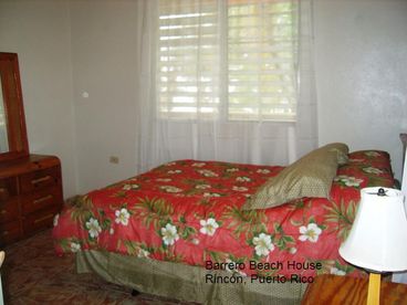 ... bedroom with a queen size bed.