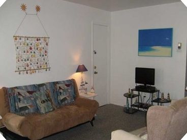 Our living room is spacious, cool and comfortable!