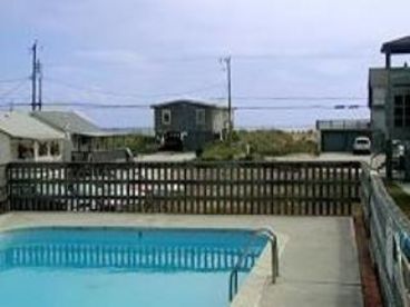 This is our pool, shared by the houses
at Sea Retreat. The background shows the ocean, slightly.