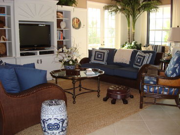 Our lovely living room complete with TV, DVD, ipod connector and  stereo with french doors onto deck