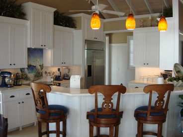 Modern kitchen with breakfast bar has all the conveniences 