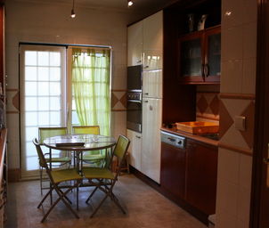Kitchen with small patio to the garden