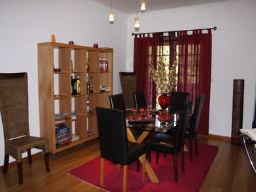 Dinning room with double doors to another patio