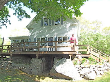 The deck on the back of the cottage.