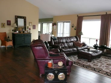 New Hardwood Floors - Stone Fireplace - Large Windows - Outdoor Deck w/Awning