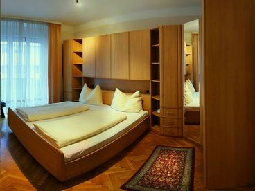 bedroom with king sized bed apt. no. 6 and 12