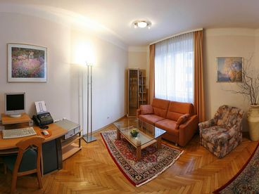 Living room with high quality sofa pull-out bed and computer work station apt. no. 6 and 12