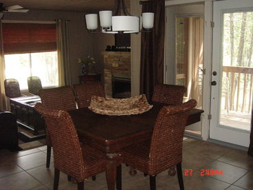 Dinning Room & Living Room with beautiful garden doors to patio