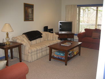 Family Room in Basement, which goes out through a sliding glass door onto deck